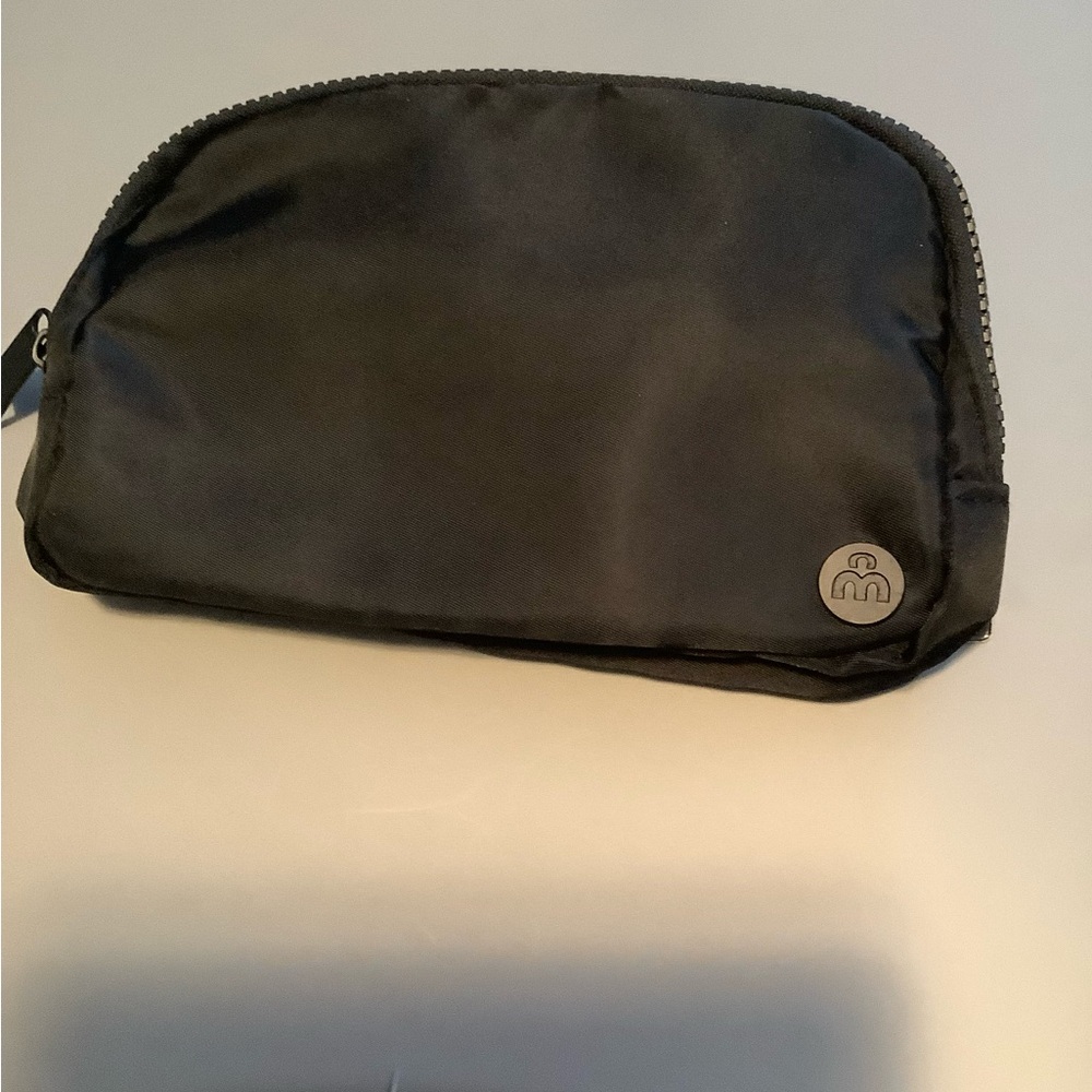 Black waist bag or Fanny pack 9”X5” NWT.